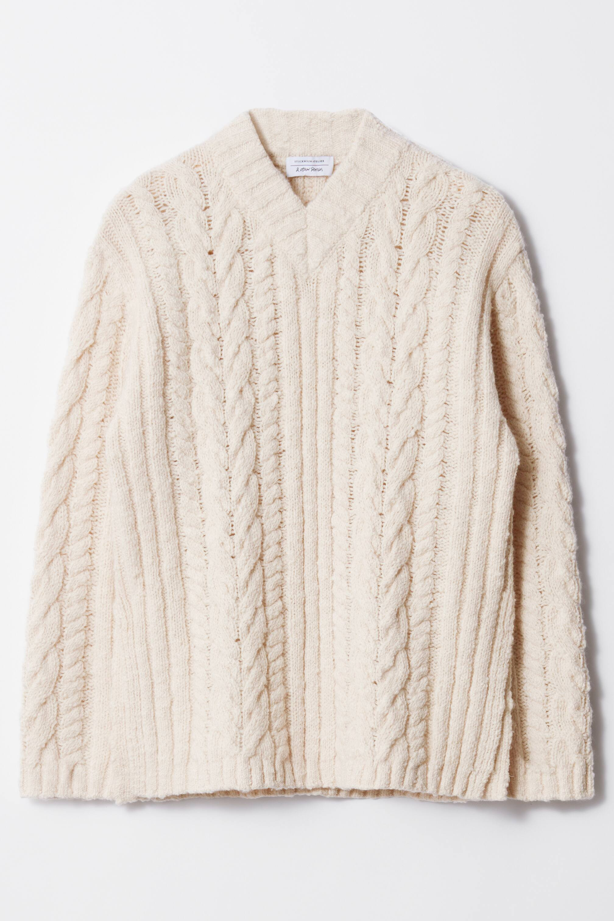 Strickpullover mit Zopfmuster und V-Ausschnitt | H&M (DE, AT, CH, NL, FI)