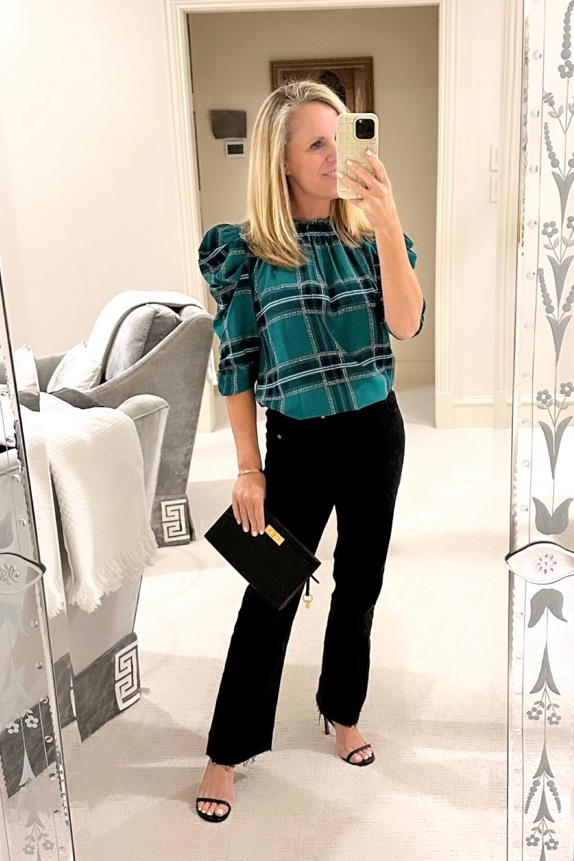 Darling emerald green, tartan plaid blouse with puff sleeves
Best most flattering black denim with raw hem
Black heel sandals 
Black clutch 
Casual holiday party look 
Girls night out
On sale! 

#LTKHoliday #LTKover40 #LTKfindsunder100