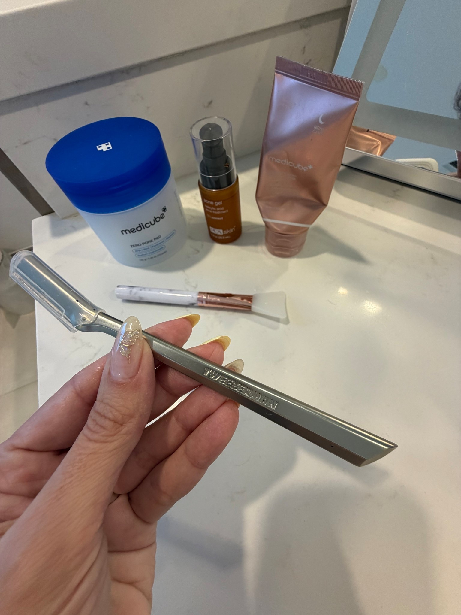 You need to remove the dead skin cells in order for any product to work and penetrate.