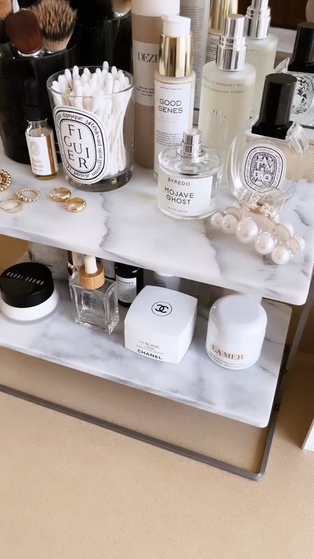 Organization tip: use a tiered tray to keep your bathroom counters organized and your beauty products visible 

#LTKstyletip