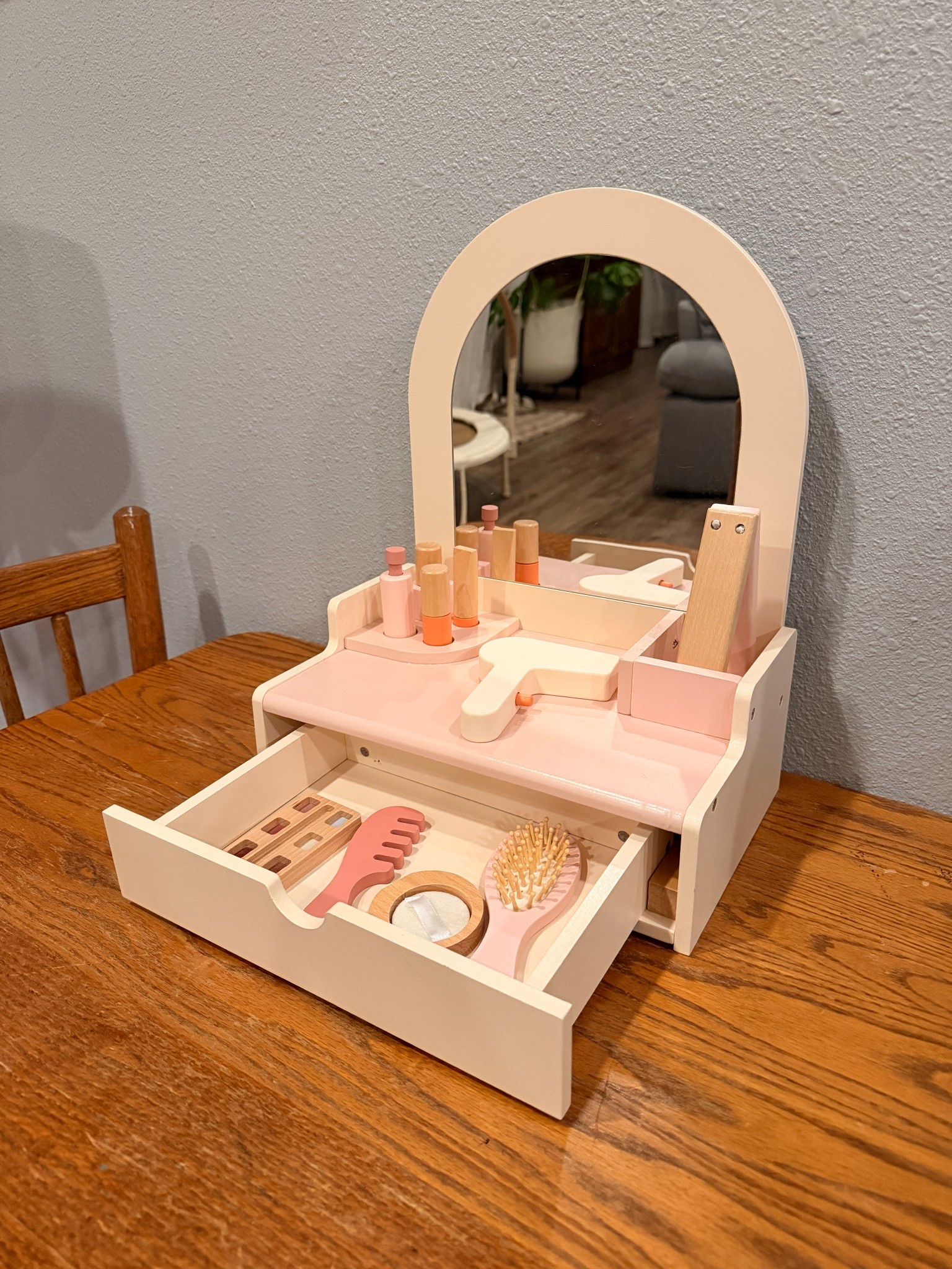 Toddler girl play wooden vanity set. My daughter loves this and I love that it sits on top of a table! Such good quality! 

#LTKmomlife #LTKKids #LTKHome