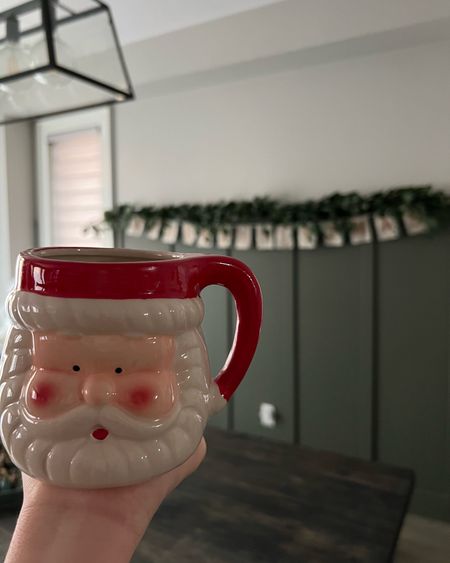 Adding a little festive decor slowly to the house! This banner is a few years old from Canadian Tire but I’ve rounded up a couple similar ones below, as well as the exact Eucalyptus Garland I have here and some similar Santa mugs to this one I got at the dollar store! 

#LTKunder50 #LTKHoliday #LTKhome