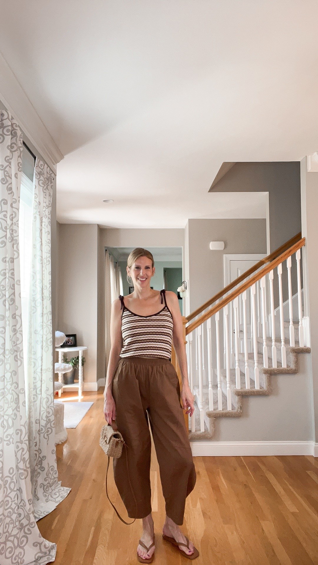🤎 Loving this summer look! These Amazon barrel pants are lightweight, comfortable, and so easy to style. Paired with an Old Navy striped tank and a woven handbag for an effortless everyday outfit. ☀️✨

#LTKOver40 #LTKSeasonal