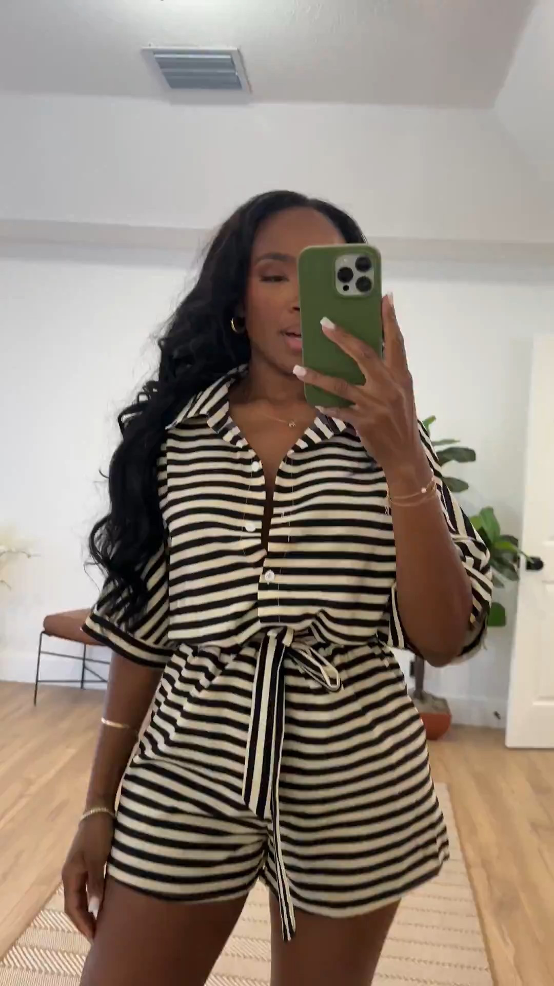 Easy, polished, and on repeat 🤍🖤  

This striped romper is the definition of effortless style. The relaxed button-down top gives it that laid-back vibe, while the waist tie cinches everything in for shape. It’s one of those throw-on-and-go pieces you can dress up with heels or keep casual with sandals — which means the cost per wear will be working overtime.

Comfort meets chic.

Perfect for:
• Weekend brunch  
• Vacation days  
• Errands in style  
• Casual date nights  

📏 Sizing:  
Romper: Size Small  
Sandals/Shoes: True to size  

📐 Measurements:  
5’4” · 138 lbs · 34D bust · 27” waist · 40” hips  

Save this if you love a classic black and white moment.

Striped romper women, black and white summer outfit, casual chic romper, waist tie romper styling, vacation day look, effortless everyday outfit.

Follow me on Instagram and YouTube @kirasfashionfinds