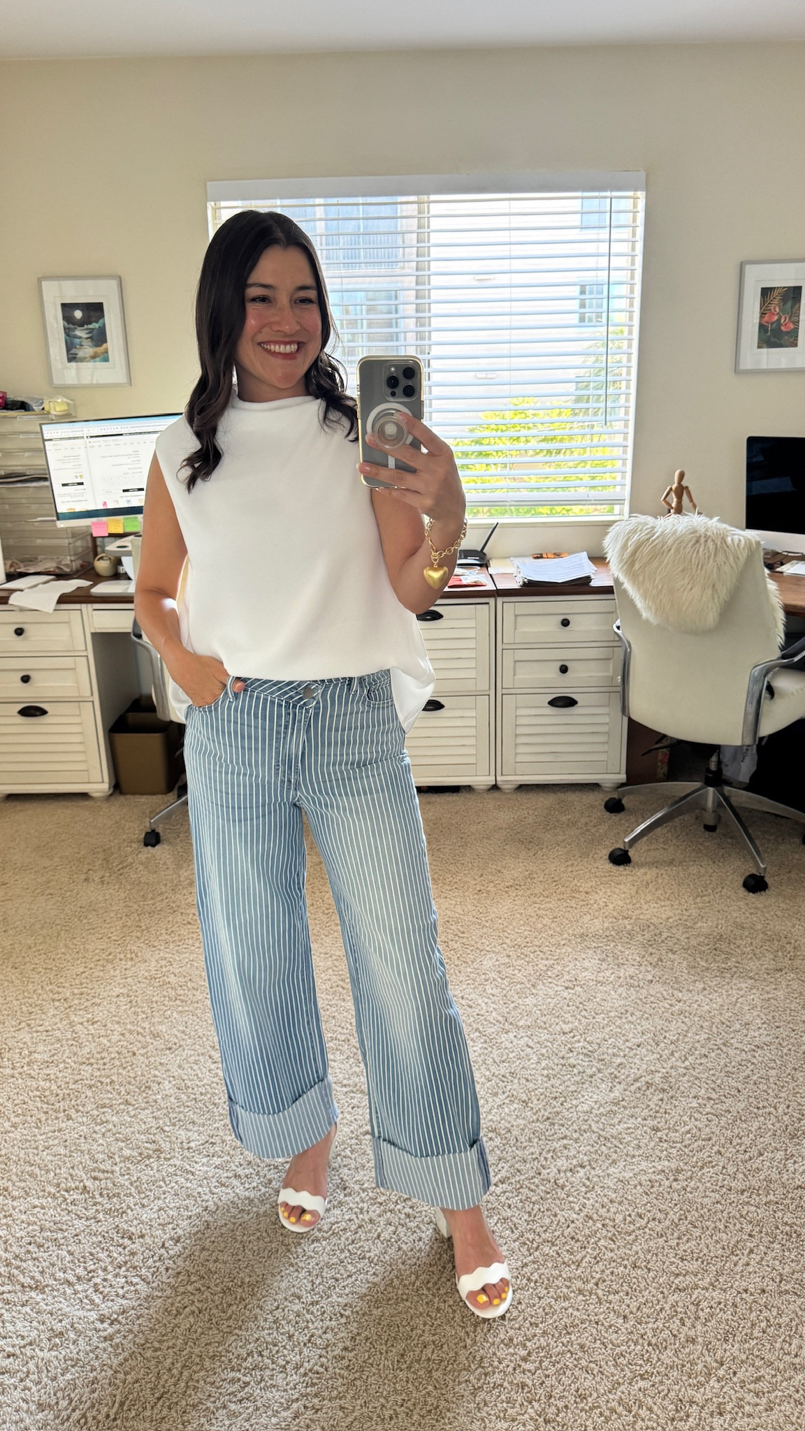 Work blouse: loving this asymmetrical work blouse from Bloomingdale’s. Pair it with any work bottom, jeans, or a leather skirt. Runs slightly big, order a size down. 
@bloomingdales #bloomingdales #ad

#LTKStyleTip #LTKOver40 #LTKWorkwear