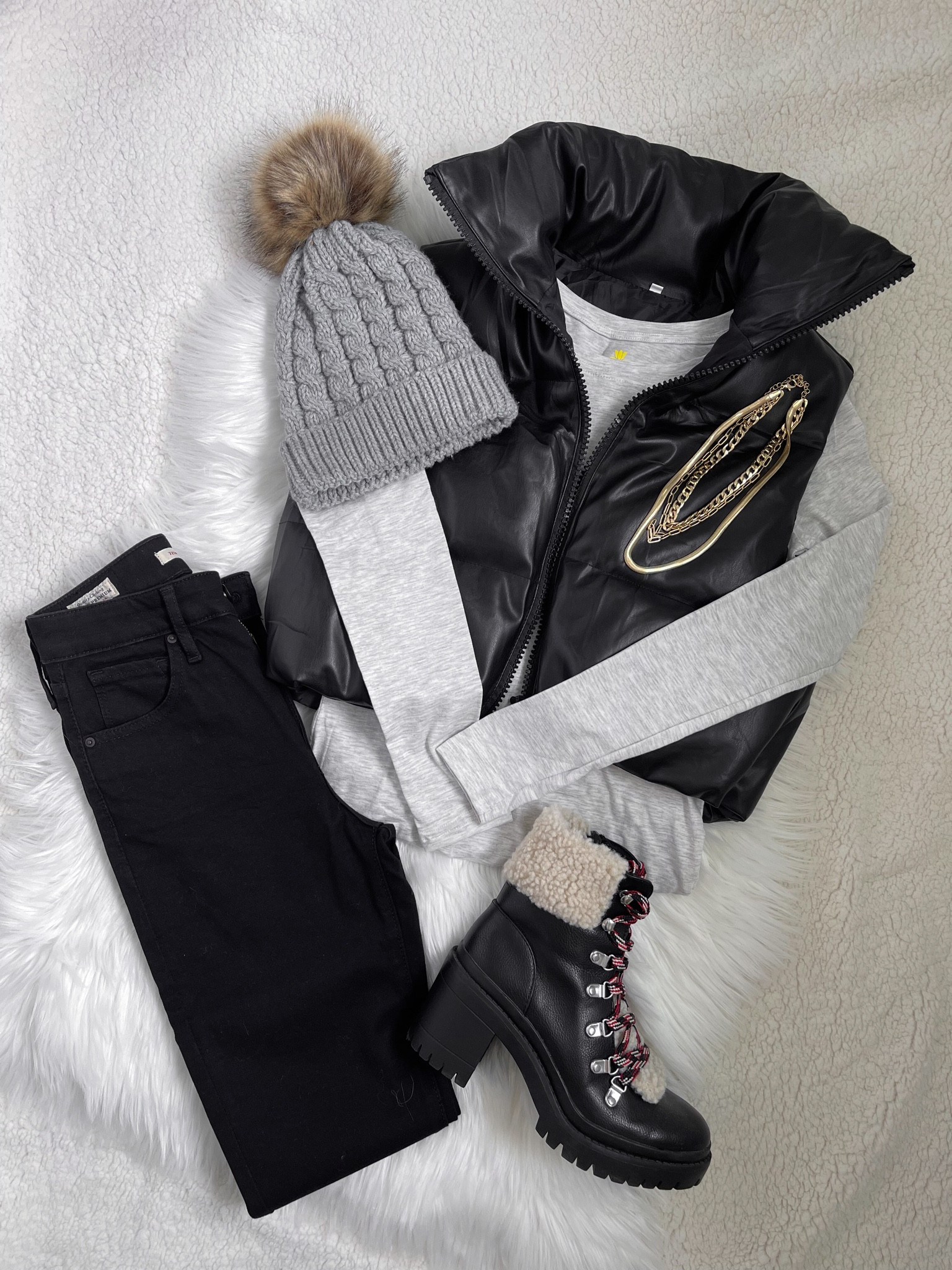 Puffer vest. Winter outfit. Gold layered necklaces. Black Sherpa boots. Pom beanie. 

www.livingbarelyblonde.com
#barelyblonde #jenniferxerin #stylewithjen #kristah #treasures #daniau #ltkwinter #wintercasual

#LTKunder100 #LTKSeasonal #LTKFind