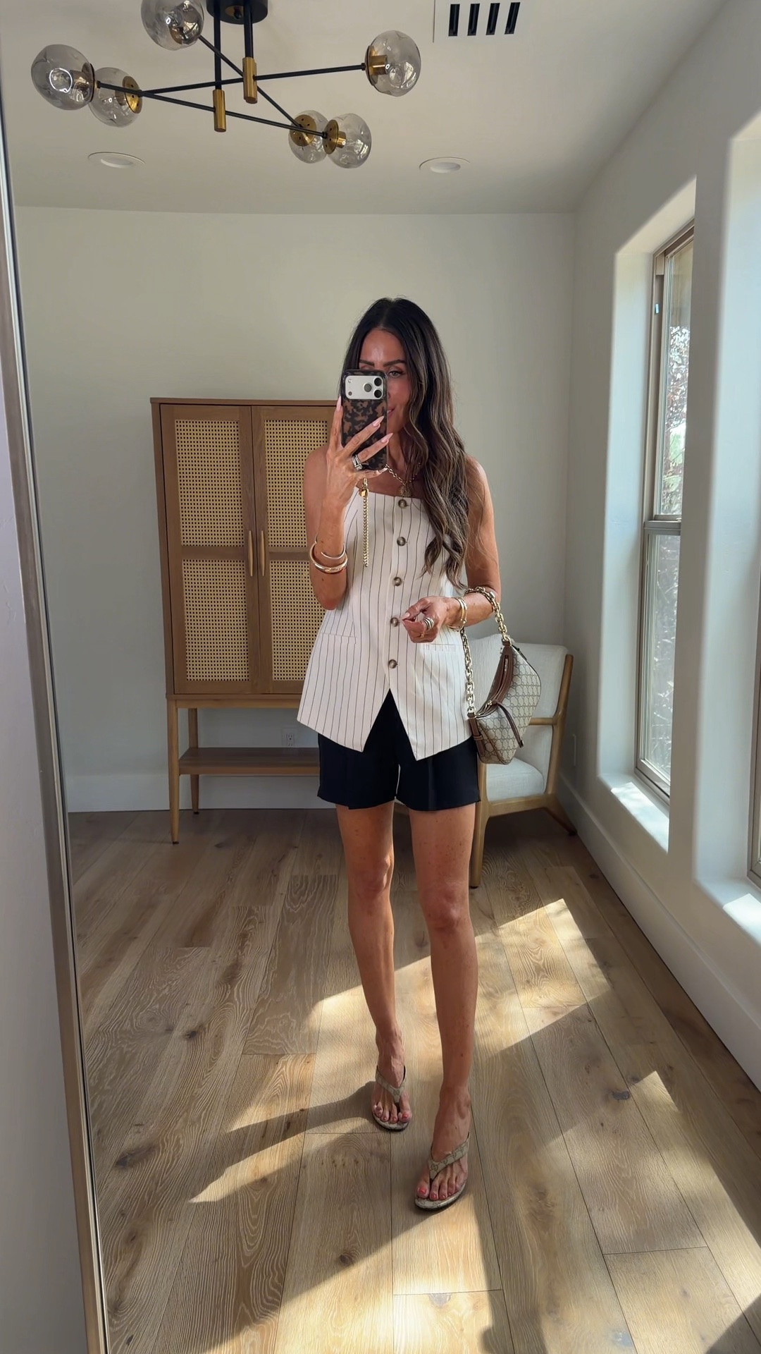 High/low staple ootd. This walmart linen blend vest is on clearance under $10 with all the sizes…wearing small, could have sized down to xs
These amazon shorts I’ve worn all summer and own in a few colors, sz small 
Paired with designer staples: Gucci thong sandals run tts(fav summer sandal)
The mini Gucci chain bag(comes with crossbody) I always carry

#LTKOver40 #LTKSeasonal #LTKSaleAlert