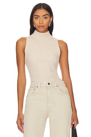 Alice + Olivia Darcey Single Layer Turtleneck in Almond Heather from Revolve.com | Revolve Clothing (Global)