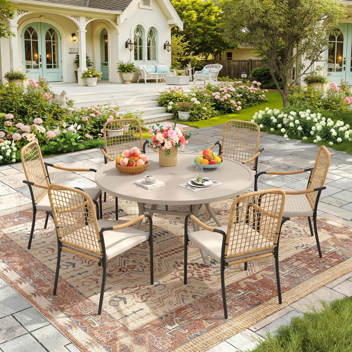Transform your patio into an entertainment hub with this 6-person round dining set. It boasts a m... | Wayfair North America