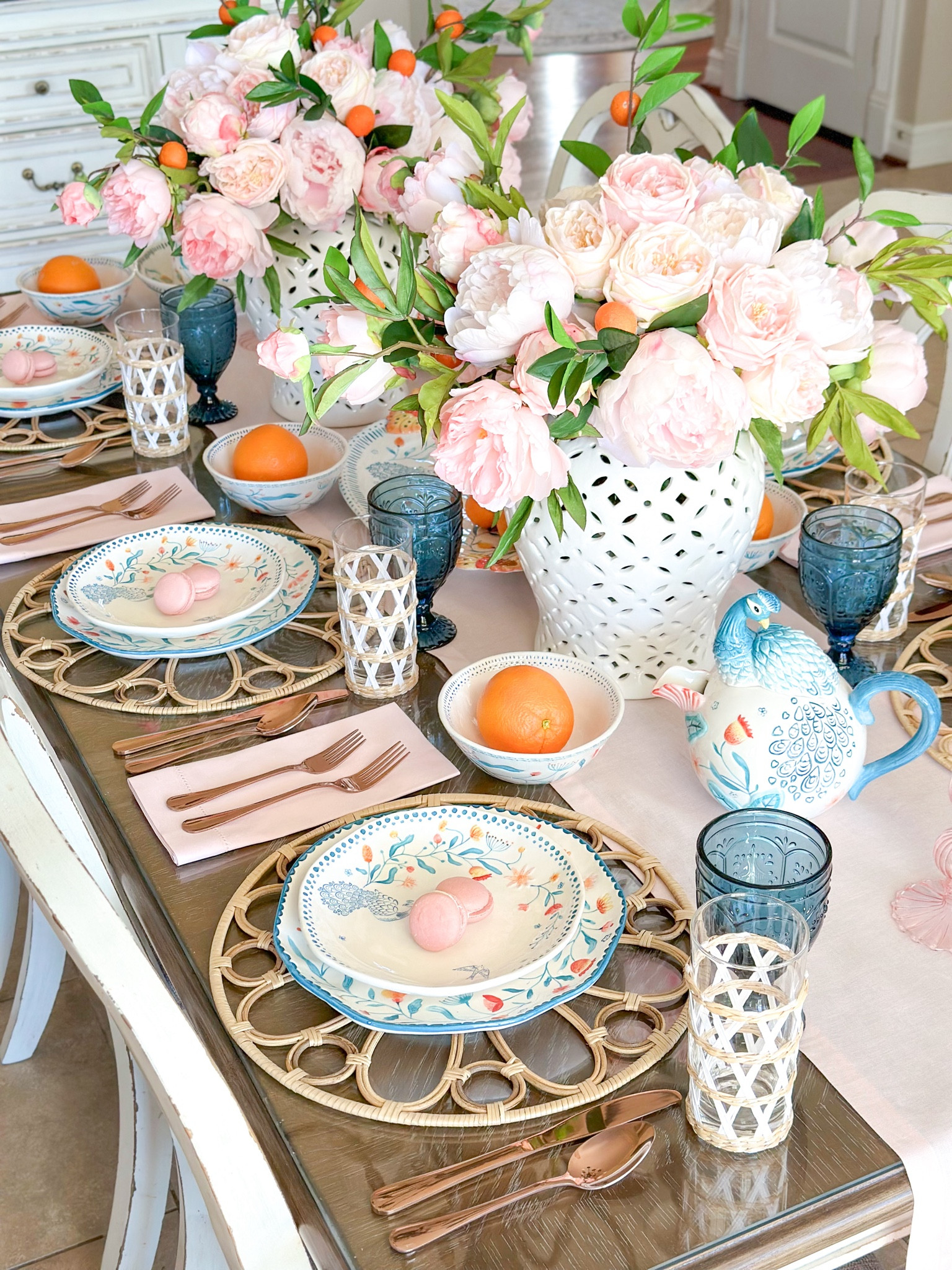 Shop my “Citrus Paradise” Spring Tablescape featuring the gorgeous brand new Gracie collection from Fitz and Floyd!

Mikasa, spring table, spring entertaining, pink flowers, pink peonies, teapot, peacock decor, pink napkins, woven placemats, pottery barn style, blue goblets, woven glassware, pink table runner, pitcher, serving platter, white ginger jars, table setting ideas, orange tree, floral arrangements, faux flowers, rattan ginger jars

#LTKhome #LTKstyletip #LTKSeasonal