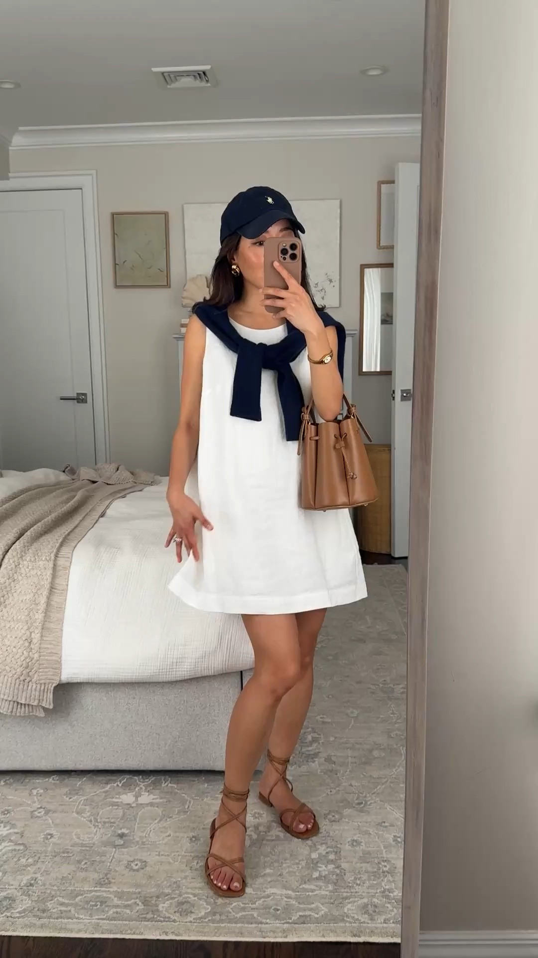 Sizing info below! A favorite for hot weather 
• Athleta linen dress xs petite, runs big! Very generous wide fit on me so size down if you can, 100% linen with lining 
• quince cashmere sweater xs 
• Margaux sandals 5 
• Polo hat 
• Polene bag, linked similar 

A line mini dress, petite friendly summer dress, easy petite linen summer outfit ideas

#LTKPetite #LTKSeasonal #LTKootd