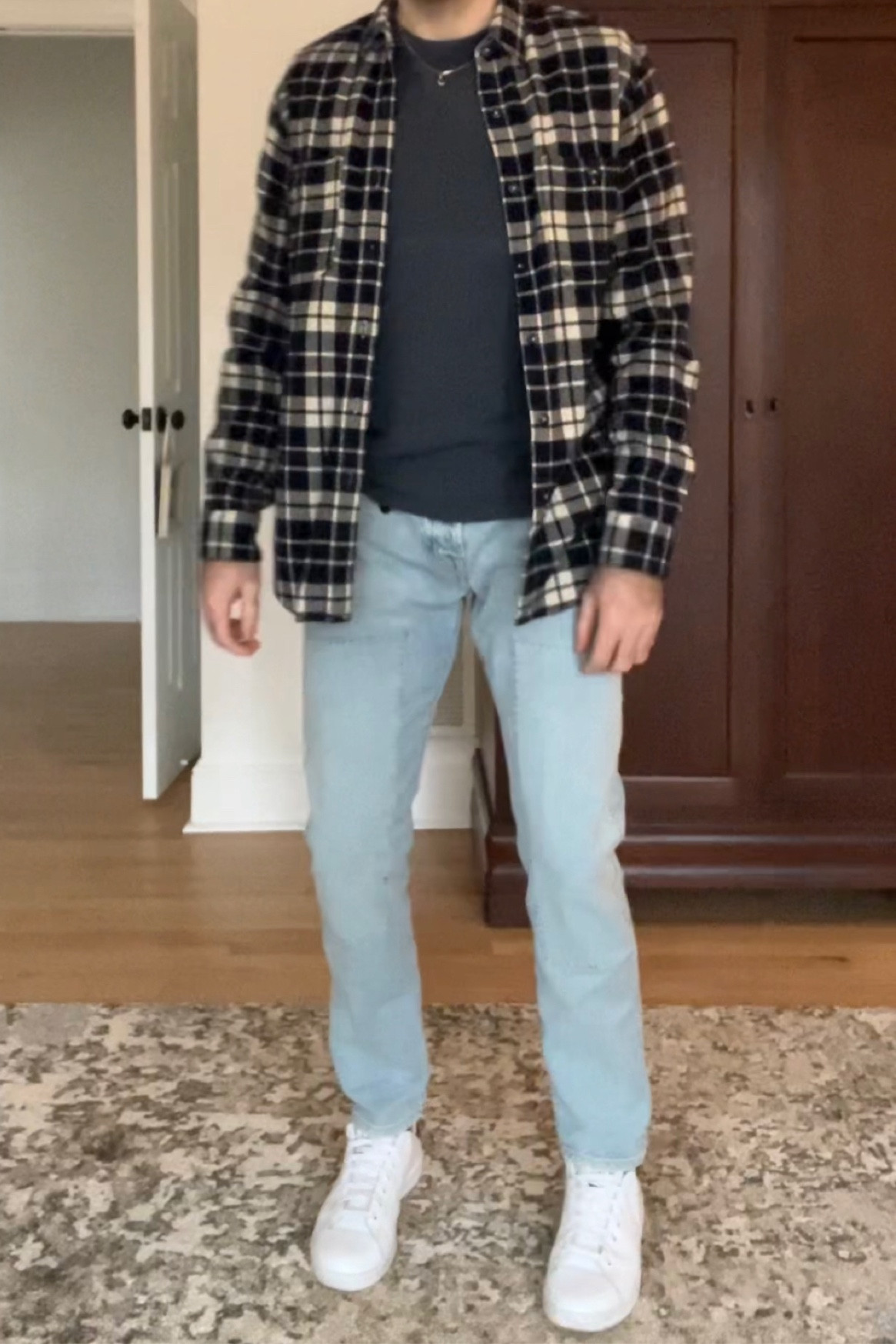 A comfy, casual fit. Some roomy jeans, a classic white sneaker, super soft tee, and a thick flannel acting as a shirt jacket. 

#LTKstyletip #LTKmens