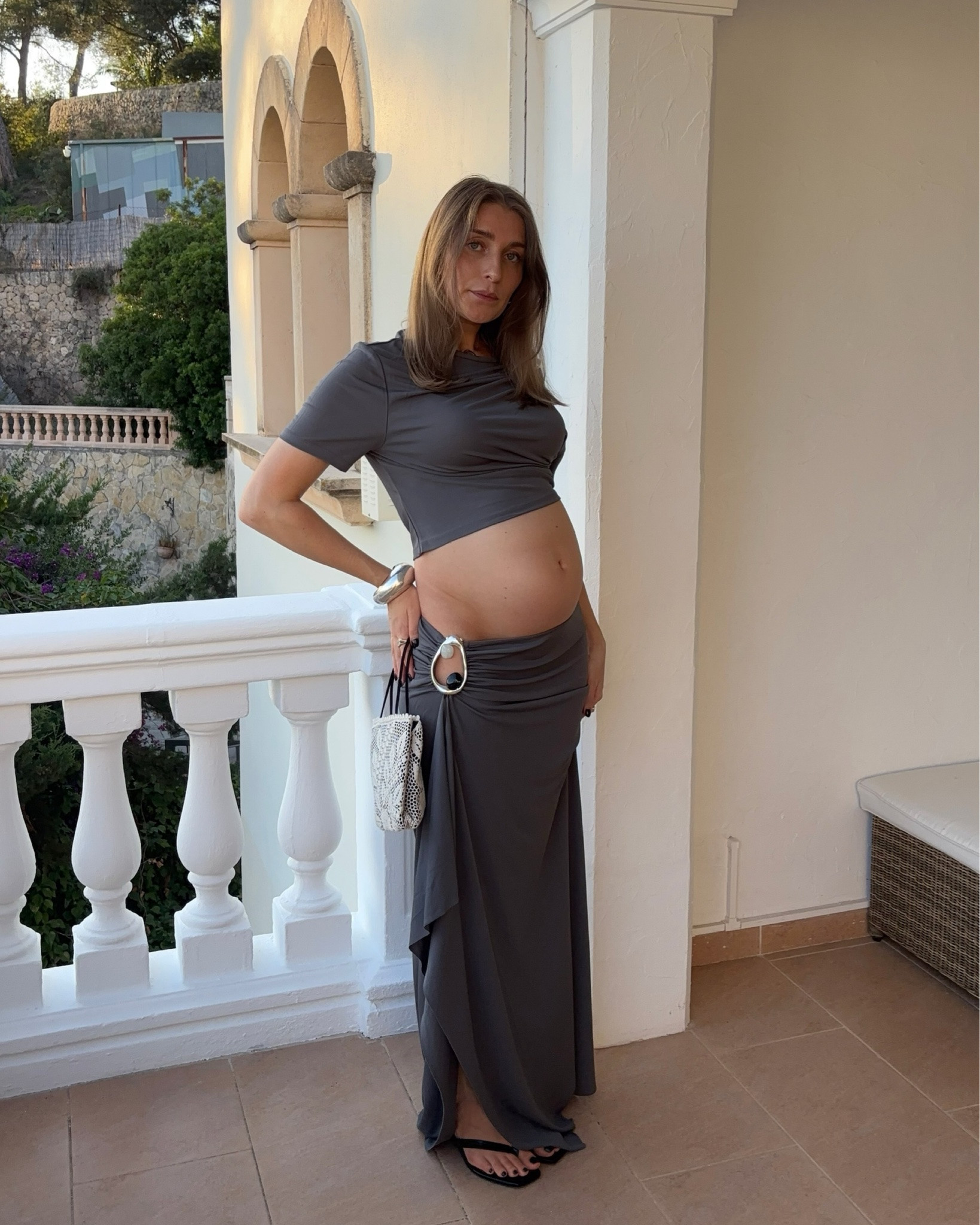 Outfit details:
Top: Christopher Esber Orica embellished jersey top - size 12
Skirt: Orica embellished jersey maxi skirt - size 12 
Bag: Magda Butrym Julia small crochet bag 
Shoes: Toteme Croc-effect leather thong sandals - size 38

#LTKsummer #LTKmaternity #LTKwedding