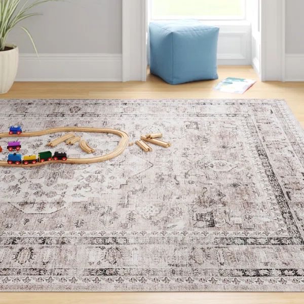 Davi Faded Stain-Resistant Machine Washable Area Rug | Wayfair North America