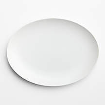 Aspen 13.75" Porcelain Coupe Oval Platter | Crate & Barrel | Crate & Barrel