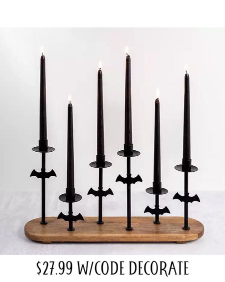 Halloween home decor 
Black Metal Bat Taper Candle Holder Runner on sale with code DECORATE. Only $27.99. Halloween table decor. 

#LTKHalloween #LTKhome #LTKsalealert