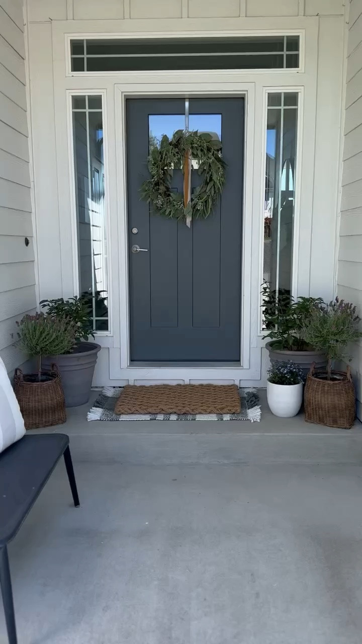 When it comes to styling my front porch I always try to create a balance! I love adding moments of symmetry by having the same planter on both sides, and creating an odd number pairing also keeps visual interest. My front door will always have a wreath on it, and this one is perfect! 

#LTKSaleAlert #LTKSeasonal #LTKStyleTip