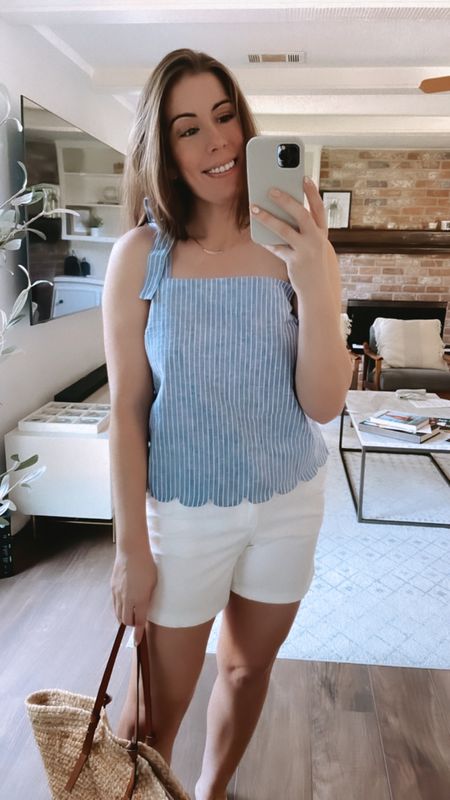 Cute summer outfit idea! This scalloped top from Amazon is so darling.  Wearing a medium. Paired with white shorts and topped off with a straw tote.

Amazon finds | Amazon fashion | Amazon style | Amazon shorts | Amazon tops

#LTKunder50 #LTKstyletip #LTKSeasonal