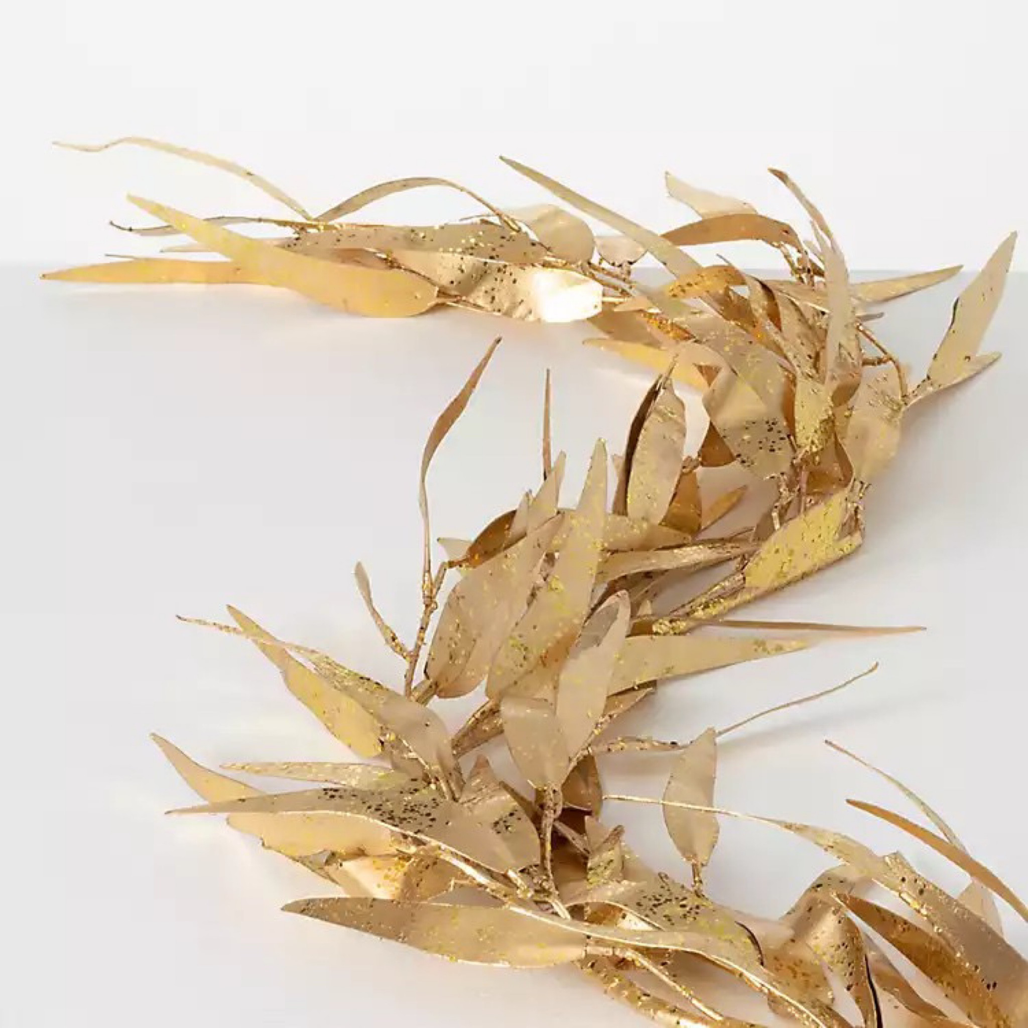 ON SALE! Gold Eucalyptus Garland! Perfect for framing a mirror, center of table, mantle. This would look fabulous around the edge of an urn with Christmas greens! A very versatile piece.

#LTKSeasonal #LTKsalealert #LTKhome