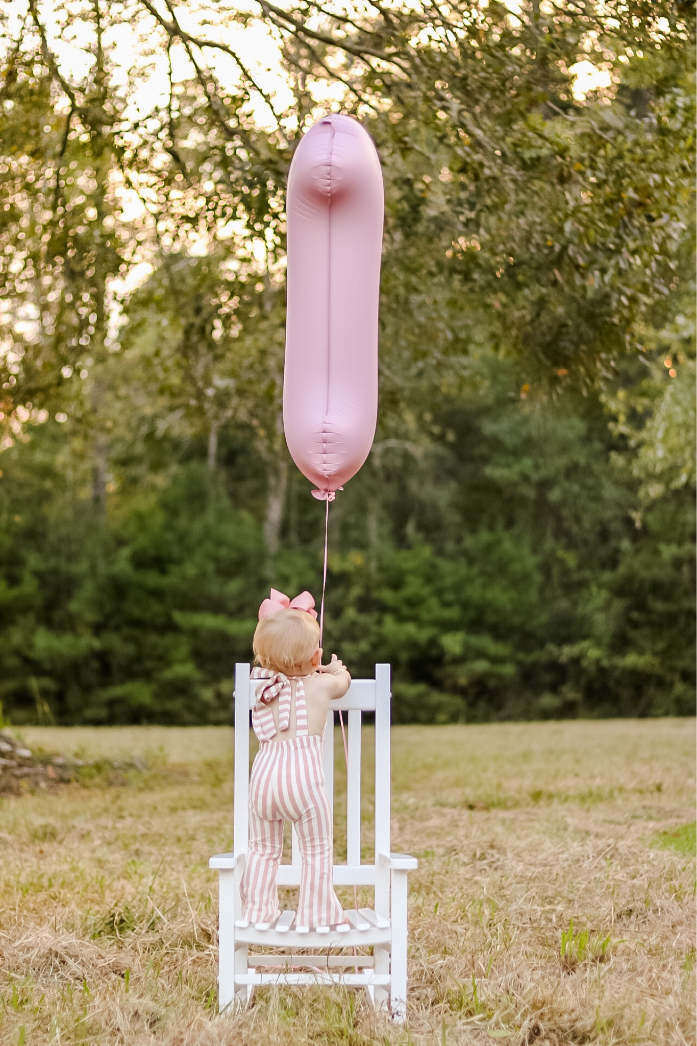 Baby girl first birthday photoshoot 🧁 
diy first birthday photos/ one year old/ bday balloons/ kids rocking chair/ baby jumpsuit/ amazon baby finds 

#LTKbaby #LTKFind #LTKfamily