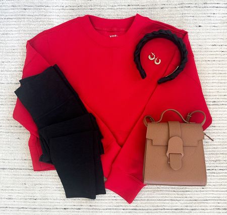 Winter and holiday athleisure outfit with red crewneck paired with leggings and accessories for a chic look. Crewneck is on sale for 25% off with an additional 15% off with code CYBER15 and earrings are 40% off!

#LTKCyberWeek #LTKstyletip #LTKsalealert