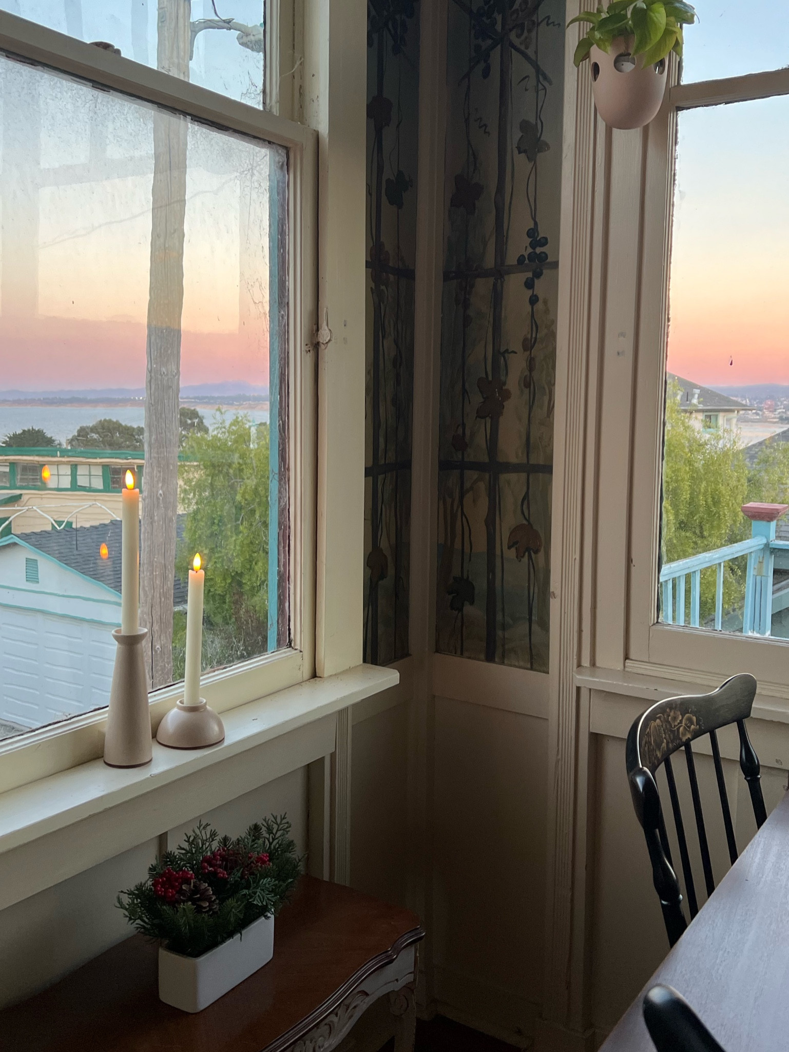 Add the ultimate cozy vibes with these LED flameless taper candles and avoid worrying about open flames. I put them in these cute ceramic candle holder from Target along with this festive pine and berry arrangement   

#LTKhome #LTKSeasonal #LTKHoliday