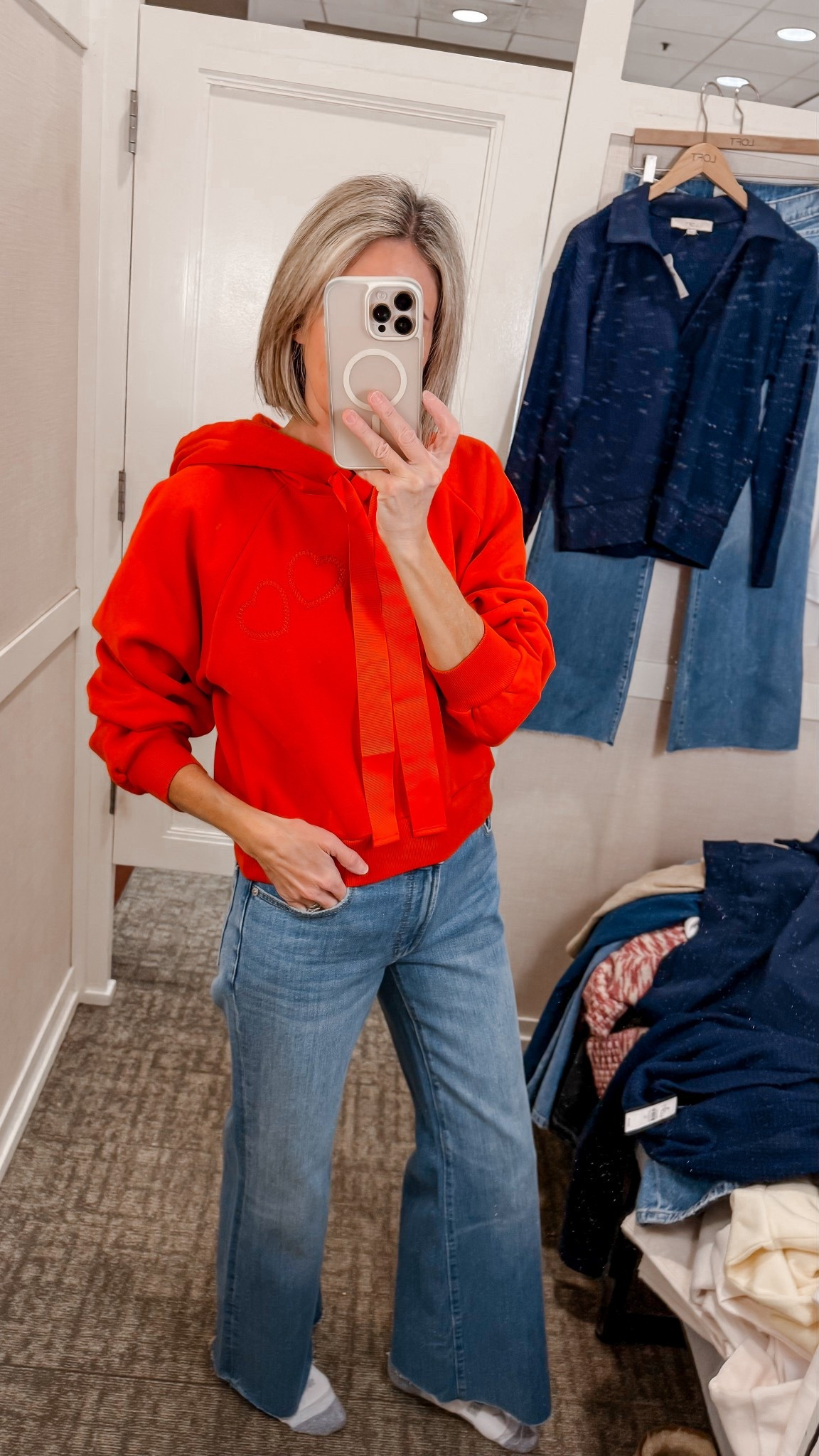 50% off sweatshirt - Valentine’s Day outfit but make it comfy 💘 This heart hoodie is giving all the Valentine’s vibes 💕 Cozy, cute, and easy to style. Also loving the new LOFT denim line—these mid-rise relaxed flares are a win! Wearing a size 26 jeans and XS sweatshirt

#ValentinesOutfit #loveloft #CasualChic #EverydayOutfits #teacheroutfit 
Teacher outfit idea

#LTKOver40 #LTKValentine #LTKSaleAlert