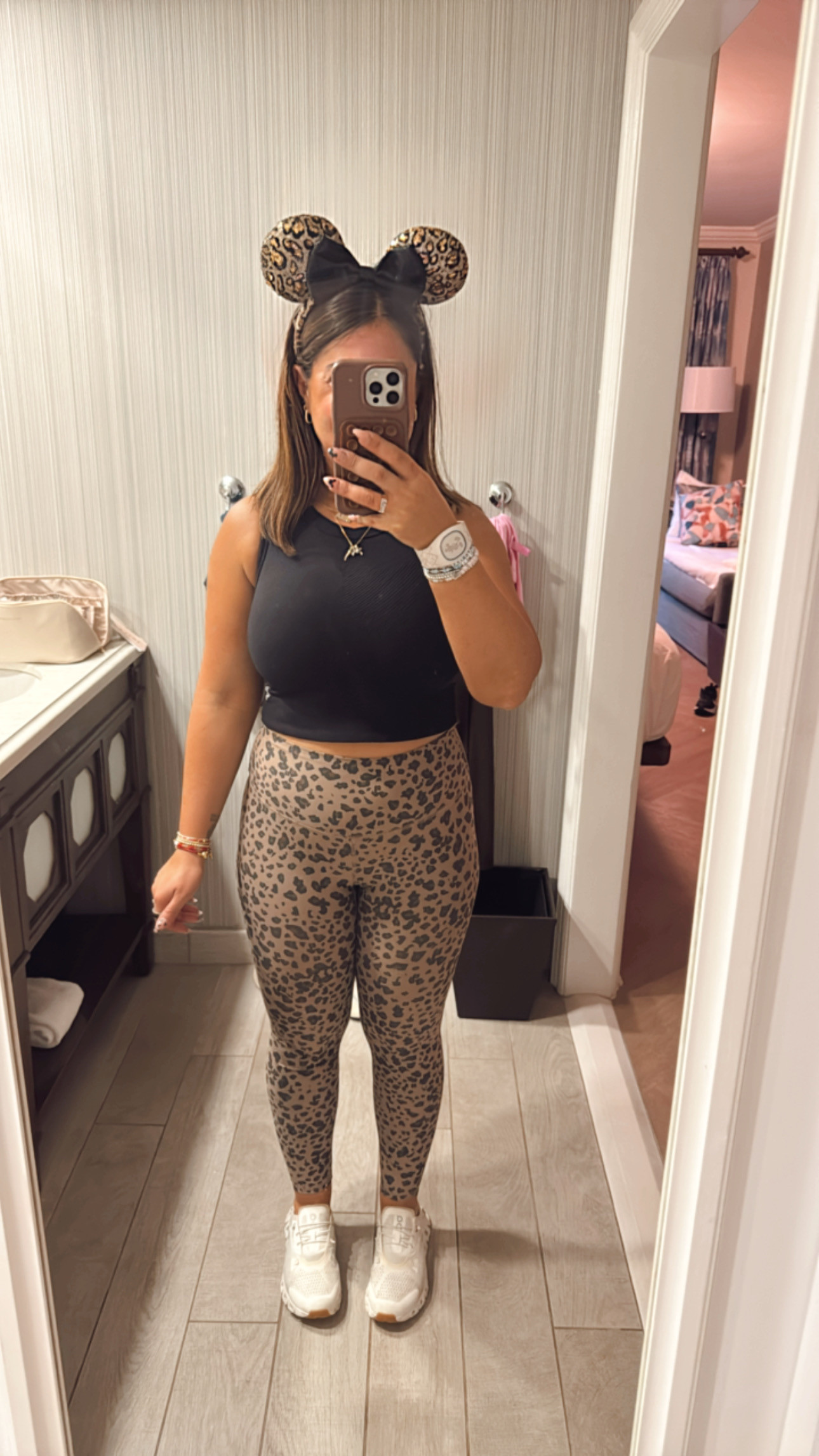 Disney gold and black outfit. Sequin leopard and black Minnie Mouse ears and my favorite leopard print leggings are a must for Animal Kingdom. High low fashion. Disney outfit inspo, Disney World outfit, Animal Kingdom mom outfit. 

 #LTKActive #LTKPetite #LTKFindsUnder50