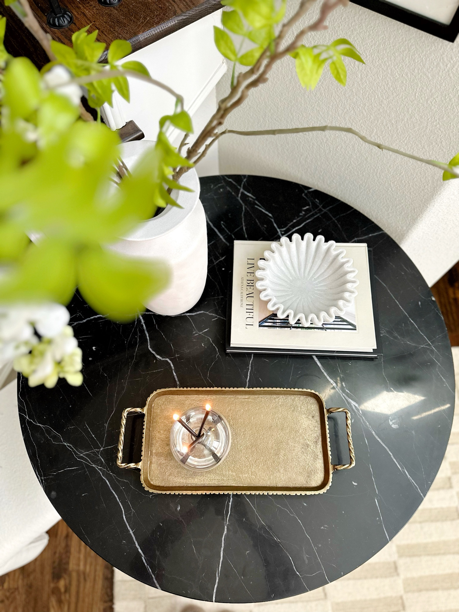 Can we take a moment for this birds-eye view? 🖤 My black marble tulip table is styled with the perfect mix of high + low pieces from Target and Amazon, proving you don’t have to splurge to get a designer look!

#LTKHome #LTKFindsUnder100 #LTKStyleTip