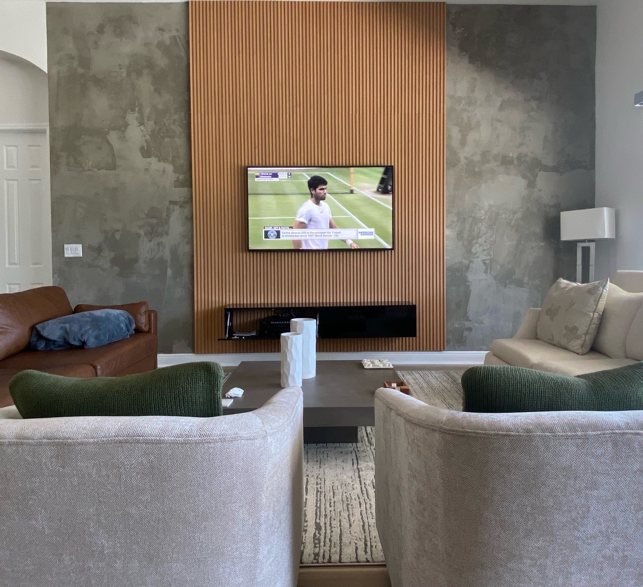 #ad I renovated my entire living room using @Wayfair pieces! From my accent wall panels to my rug and accent chairs, Wayfair is my go to for affordable room transformations! #wayfair #wayfairpartner
