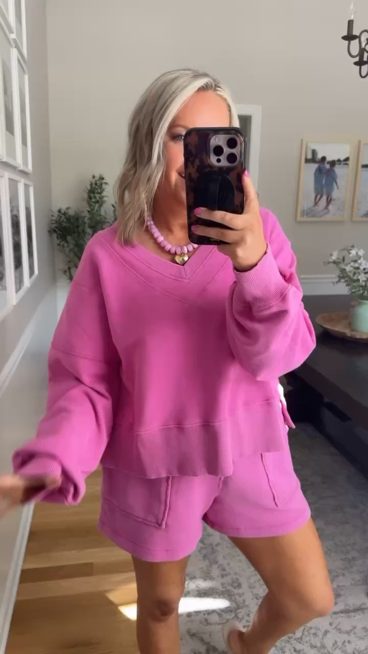 This pink lounge set is the definition of comfy but still cute. The oversized sweatshirt and matching shorts feel so good on, and the bright pink color makes it feel way more fun than your average lounge set. Perfect for slow mornings, travel days, coffee runs, or staying cozy with the AC blasting all summer long.

pink lounge set, comfy matching set, oversized sweatshirt outfit, cute lounge clothes, travel day outfit, cozy summer outfit, casual everyday style, bright pink outfit, comfy shorts set, airport outfit inspo, cute mom style, lounge wear set, lovelylifestyling

#LTKootd #LTKSeasonal #LTKOver40