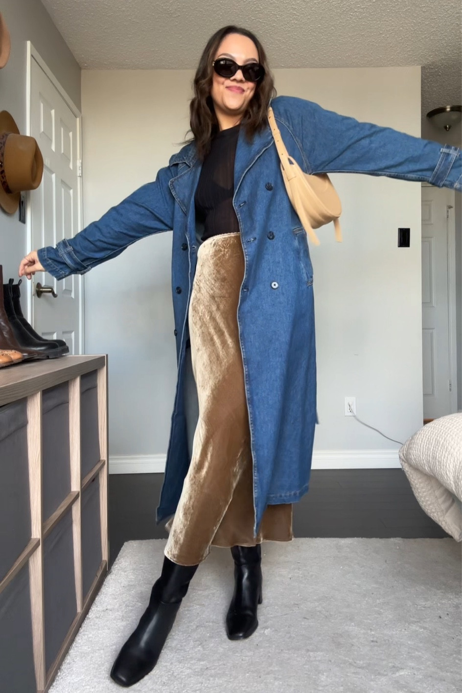 Winter outfit inspiration! Details below:

-Dissh sheer black t-shirt, I have a medium 
-Black triangle bra from Aritzia, I have a medium 
-Reformation gold velvet midi skirt, I have a size 8
-Reformation denim trench coat, I have a size medium 
-Madewell black leather knee high boots, similar linked 
-Celine Triomphe 52mm sunglasses in black acetate 
-Polène numero dix bag in tan 


#LTKVideo #LTKstyletip #LTKSeasonal