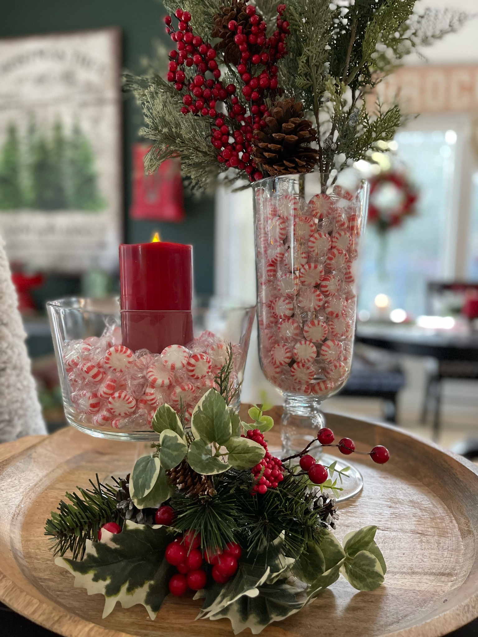 This peppermint candy table decor was so easy to make! Using a trifle dish & a burgundy flameless candle, and a double vase filled with faux holiday greens. Use faux or real holiday greens you have at home, and other sources I’ve linked here.

#LTKhome #LTKHoliday #LTKSeasonal
