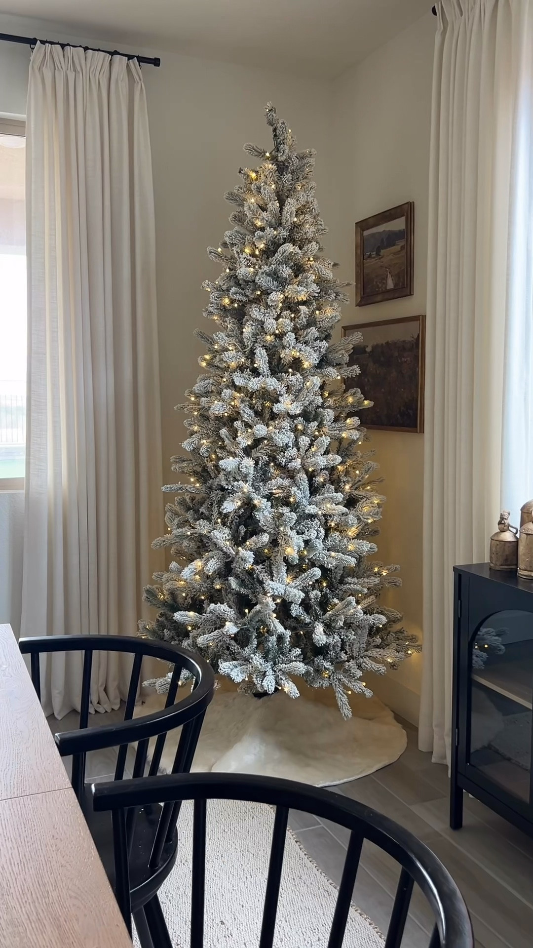 Our dining room tree is up & ready for the holidays! 🎄✨🌟 

8’ King Flock Slim Christmas Tree with warm LED lights 

#LTKHoliday #LTKSeasonal