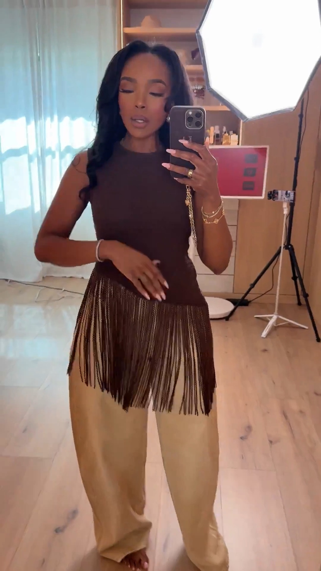 Scroll to shop!! This neutral outfit featuring a statement fringe top paired with relaxed wide-leg trousers is perfect for dinner plans, date nights, vacation outfits, or an elevated casual look.

#LTKootd #LTKgrwm #LTKPetite