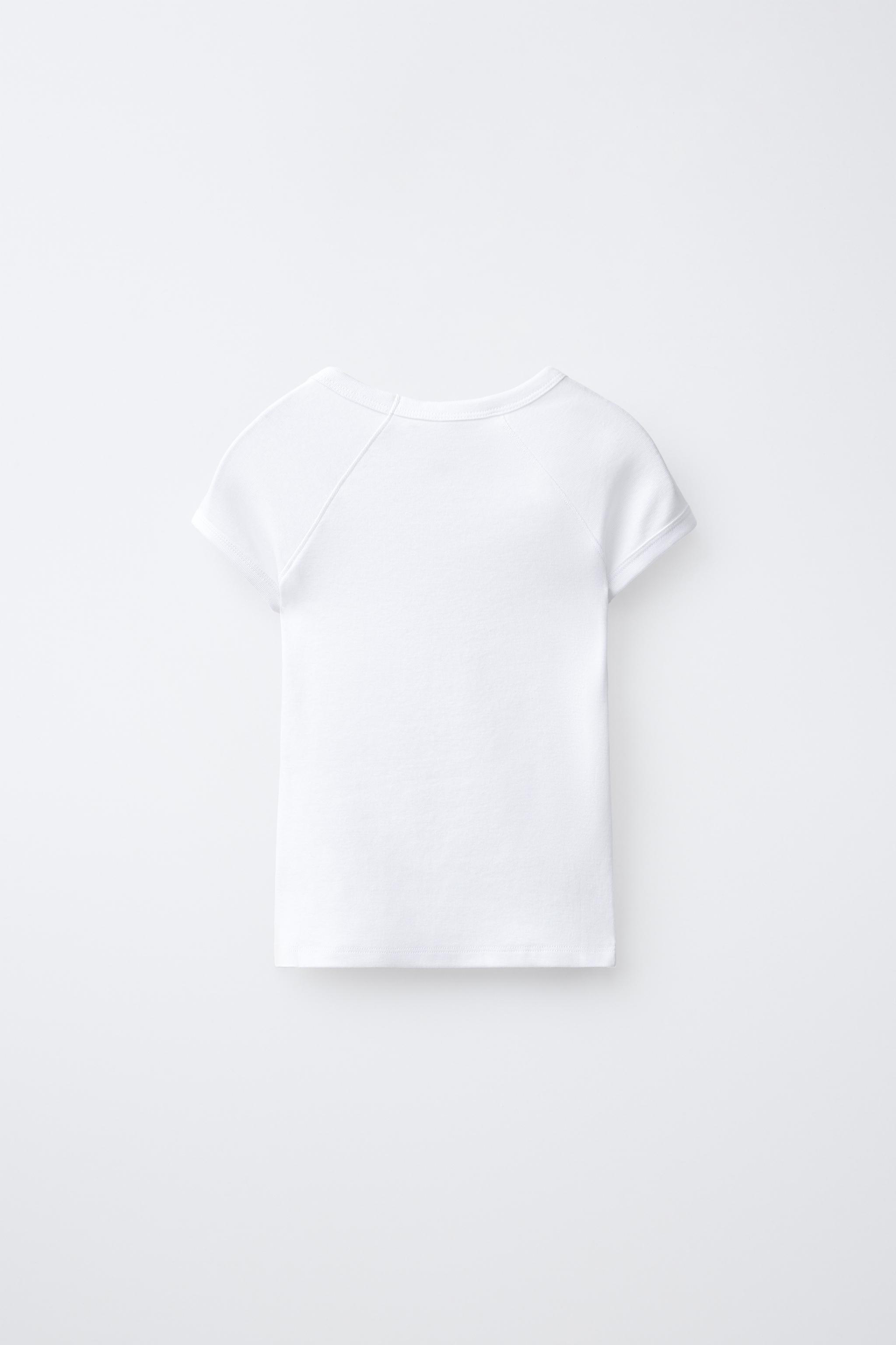 Round neck T-shirt with short sleeves. Main fabric contains 48% cotton and 48% modal. | Zara US