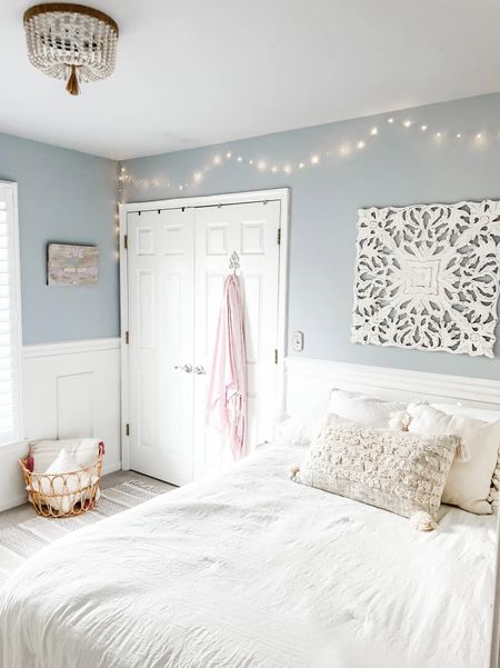 Love the cozy soft white bedding in our daughter’s coastal inspired girl bedroom!

Super soft white three piece comforter set, neutral throw pillow, neutral bedding, wood medallion wall art, coastal bedroom decor, girl room decor, twinkle lights, string lights, fairy lights, woven basket, wood bead chandelier, flush mount beaded chandelier, wood bead light fixture, neutral area rug, bedroom rug, bedroom light fixture.

Get the full details of this bedroom makeover on www.heatherkrout.com

#LTKstyletip #LTKhome #LTKFind