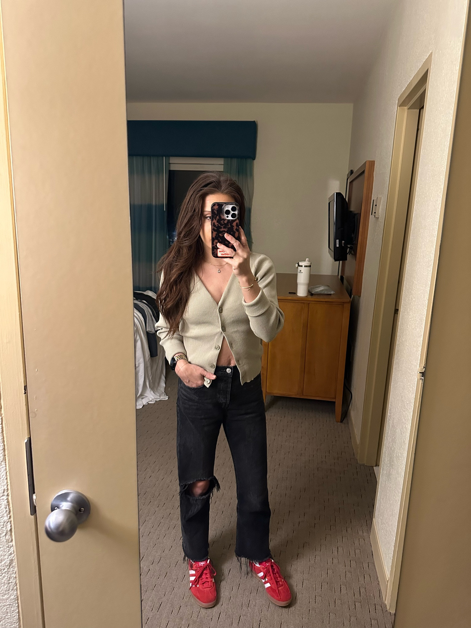 Winter in key west when it 70 degrees calls for a button up cardigan and my fav jeans 🤌🏽 and of course the pop of red gazelle adidas 👠👖🧥

#LTKShoeCrush #LTKFindsUnder50