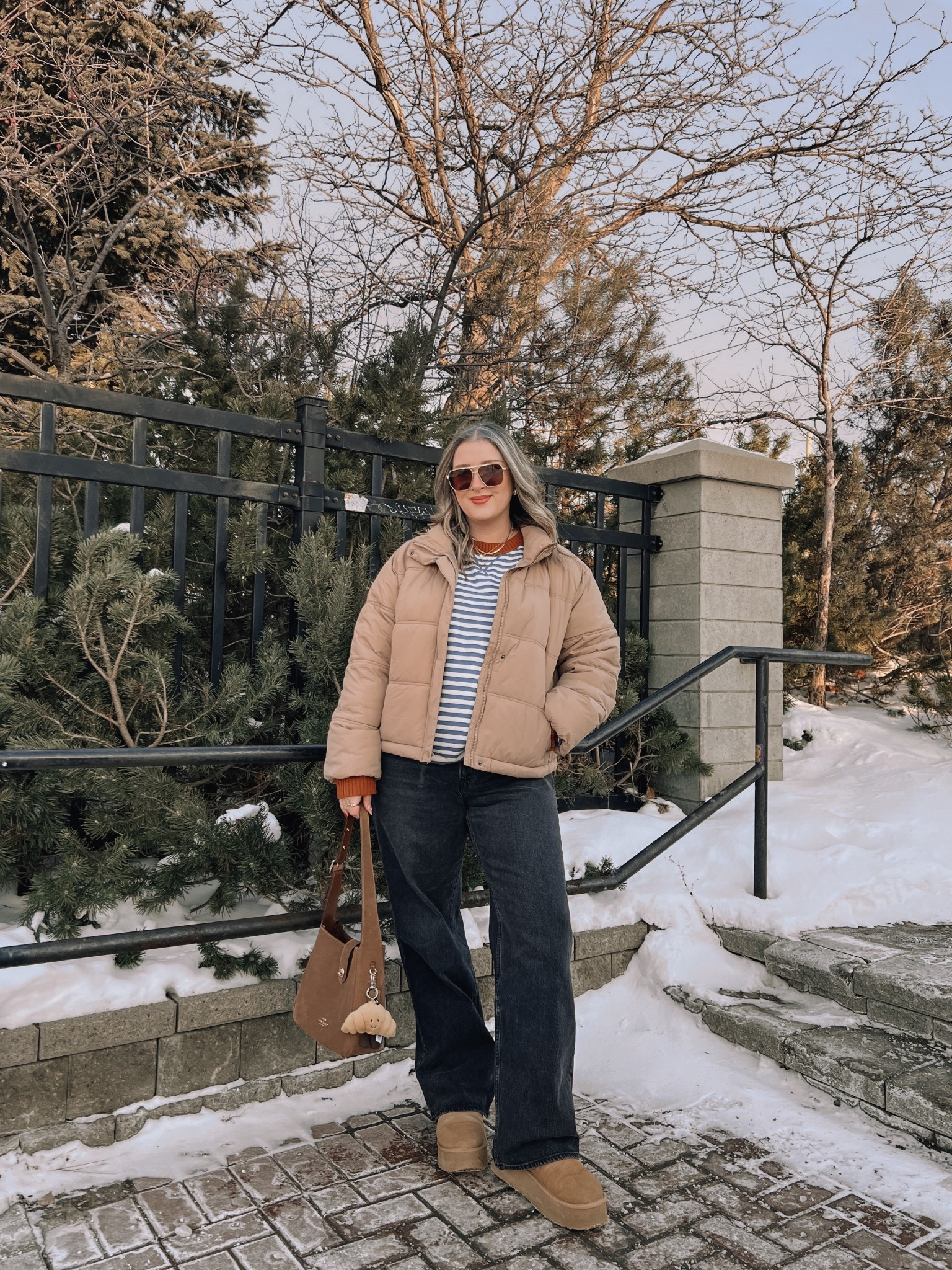 Casual winter outfit! Wearing my usual size L in the striped sweater and puffer jacket. Wearing 32 in the jeans for a looser fit. Ugg style boots are from Amazon and holding up so well! I’m usually a 9.5-10 and wear a 10. Canadian puffer jacket link under similar products 


#LTKjeans #LTKwinter #LTKmidsize