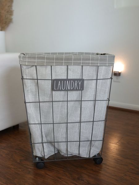 How cute is this laundry basket?! I love that it hides the clothes and keeps the area looking sleek and clean 

#LTKhome #LTKfindsunder50