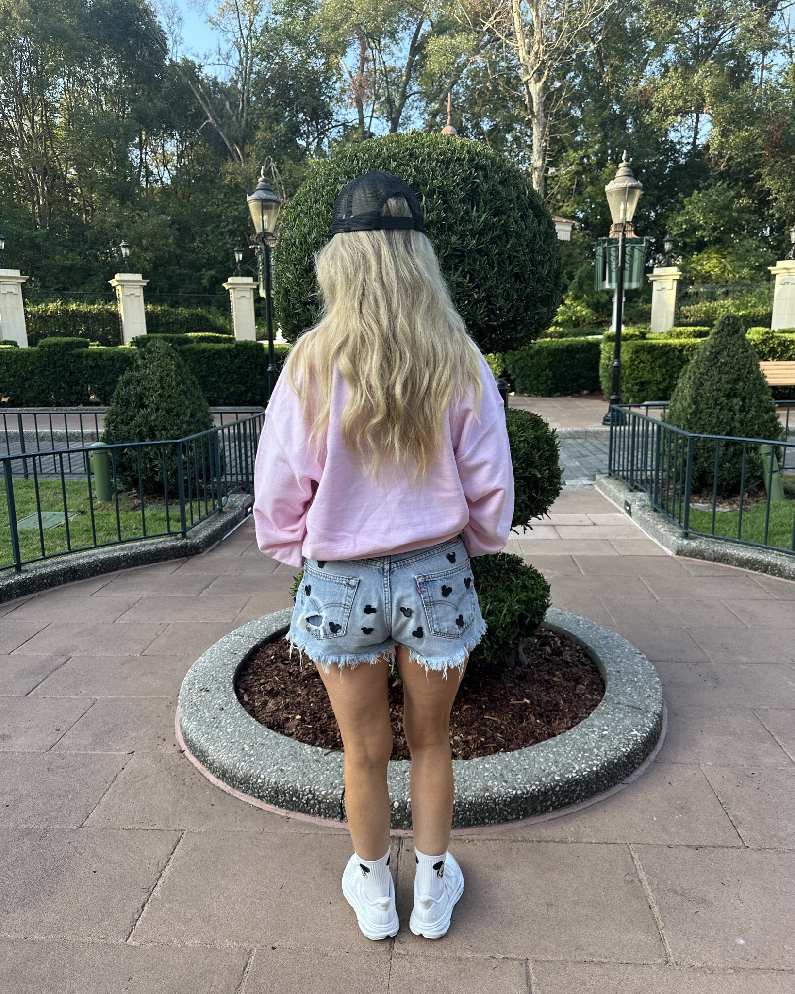 Another great Disney OOTD 💗.  A pink Mickey and Minnie sweatshirt, vintage denim shorts with Mickey patches glued on, a Mickey ball cap and your ready for a day in the park 💗 

#LTKootd #LTKgrwm #LTKTravel