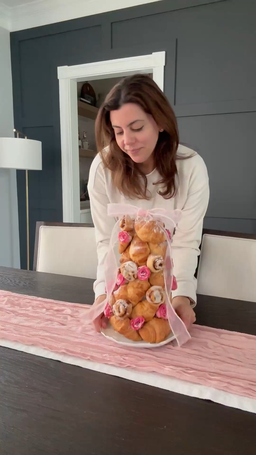 Mother’s Day brunch idea your guests are going to love!
Edible croissant tower 🥐 so easy to make and looks so impressive on th buffet table 
What you need 
Styrofoam Cone size 18”
Toothpicks
2 dozen Croissants mini 
12 but size cinnamon rolls 
Small roses
Powdered sugar 
Ribbon for decoration 

#LTKMothersDay #LTKHome #LTKSeasonal