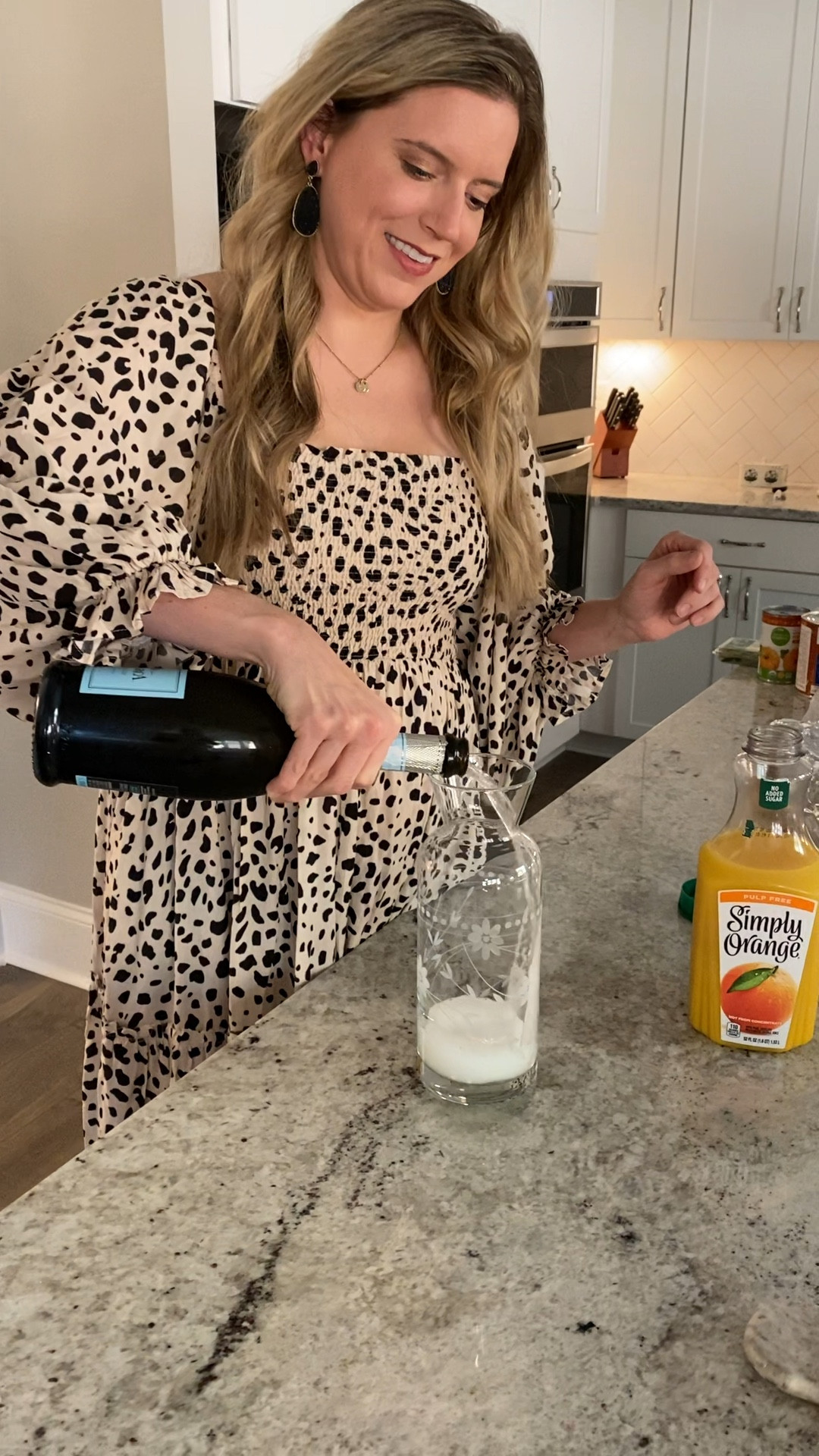 The absolute tried and true perfect mimosa recipe. Trying to be hostess with the most-ess in my favorite Anthropologie dress 😉 

#LTKHoliday #LTKSeasonal #LTKhome