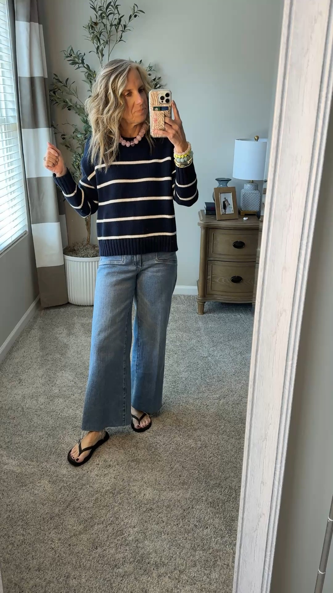 Easy spring look for a cooler day. I LOVE these jeans. Wearing 27 and could have sized down. Wearing XS sweater 

#LTKOver40 #LTKdayinmylife #LTKootd