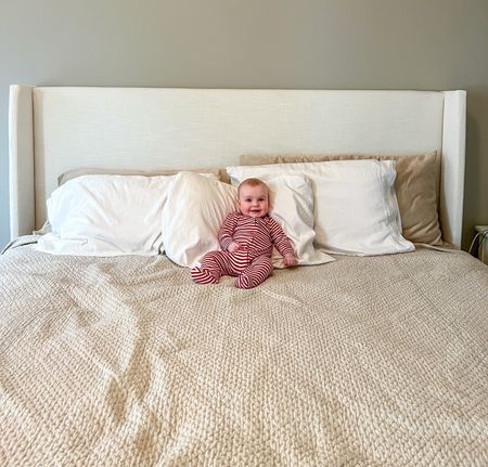 In love 😍 with my king bed frame + headboard! I think baby William does too! 

I’ve been wanting a headboard for so long to give a complete look to my bedroom. Originally, I gravitated to the Pottery Barn Harper tall headboard with storage, but the price tag was tough to justify! 

I opted for the Tilly in the Zuma White fabric instead and I think it’s perfect! 

#LTKFind #LTKfamily #LTKhome