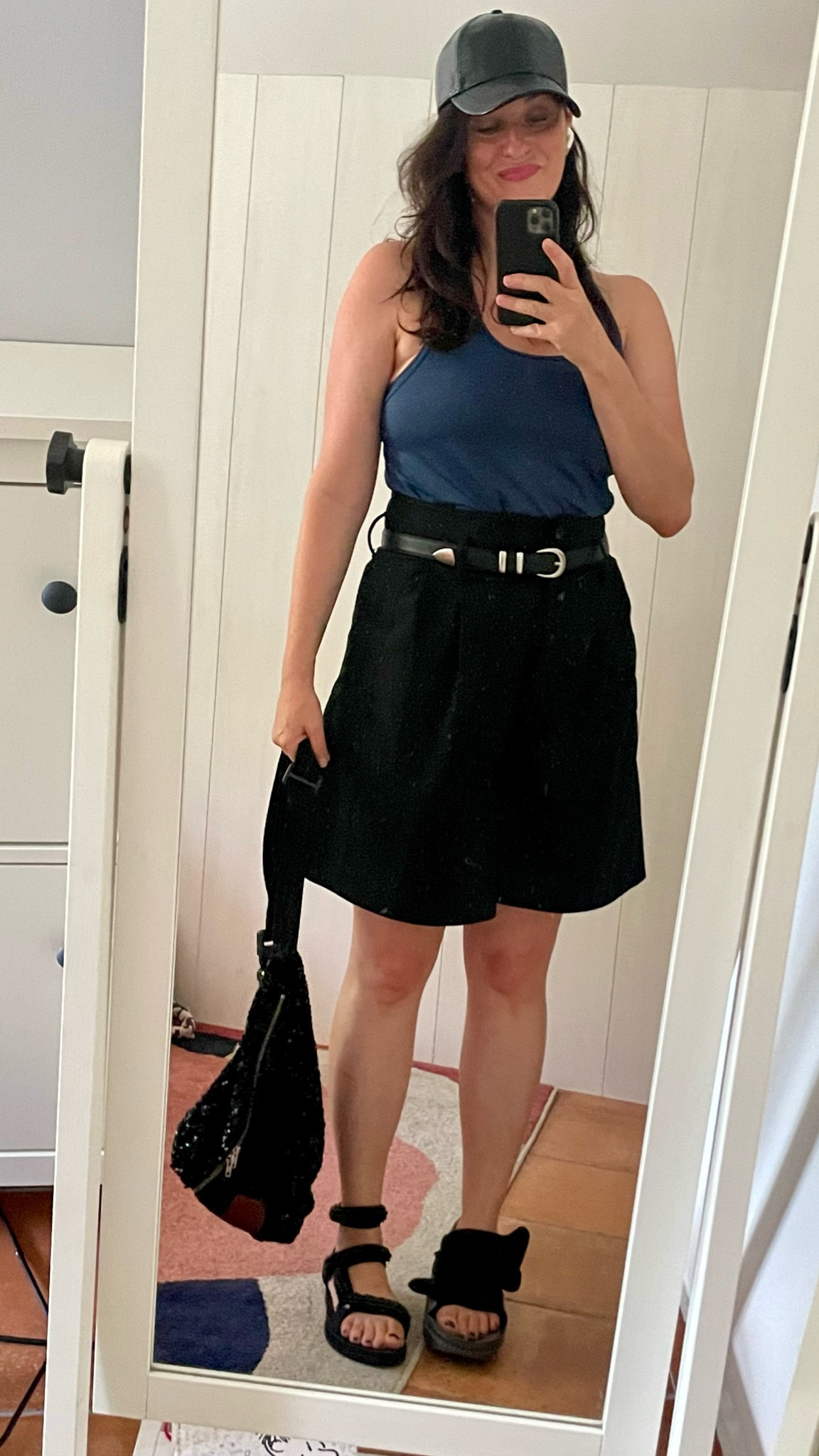 . Black patent  cap #hm (linked)
. Racerback navy tank #cottononbody 
. Western belt #zaraman (similar, linked)
. High waist pinstripe shorts #zara 
. Ankle trek sandals #arizonalove (linked) 
. Black sequins fanny pack #makemylemonade (similar, linked)
. "Amour Fou" Bisou Balm lipstick #Violette_FR (linked) 

#LTKmidsize #LTKsummer #LTKfrance