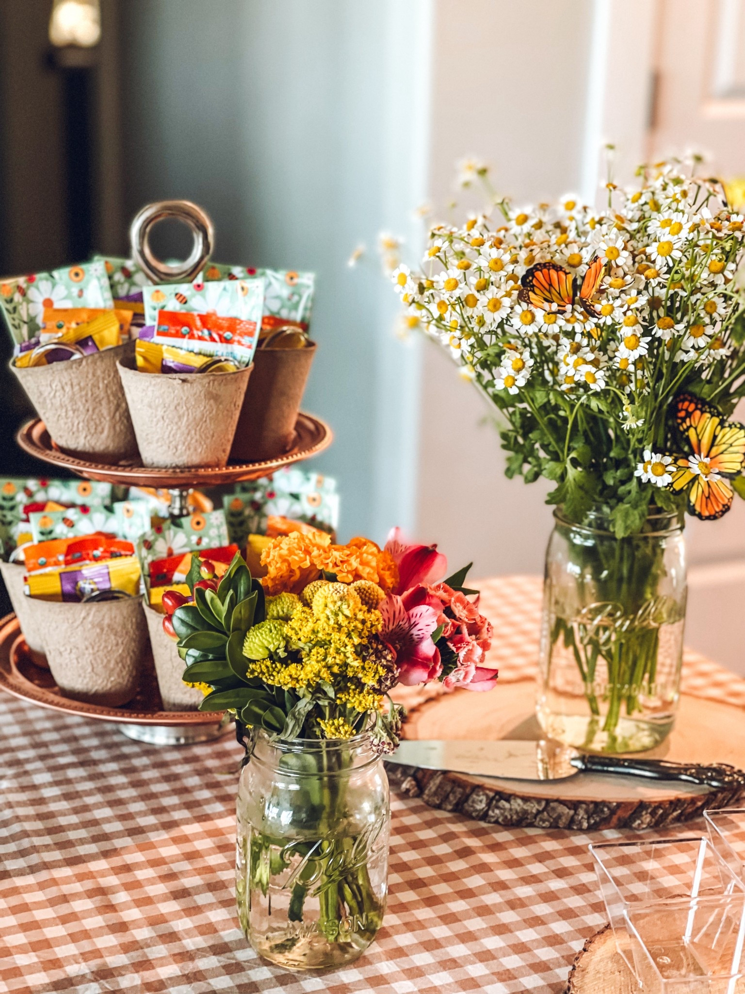 These adorable lovebug-themed party favors were such a hit! 🌼🪲 Each little guest took home a biodegradable peat planter filled with wildflower seed packets, bug-shaped gummies, insect stickers, + a mini magnifying glass—perfect for curious little explorers. We loved how these eco-friendly gifts inspired outdoor play + tied in so sweetly with the garden party vibe. Set on a tiered tray next to wildflower bouquets + butterfly accents, they were both charming + purposeful. 🐝🌸 #PartyFavors #LovebugTheme #EcoFriendlyKids #GardenPartyIdeas #babyshower #BirthdayPartyDecor #party finds

#LTKKids #LTKSeasonal #LTKBump