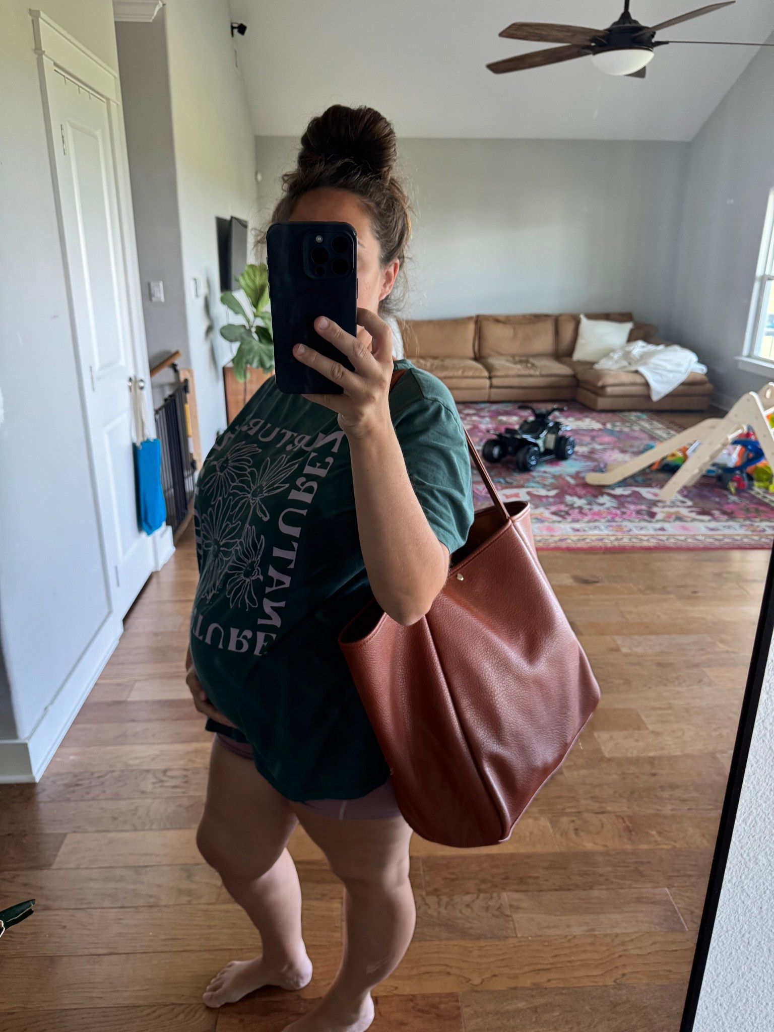 Today’s bump-friendly ootd 💃🏻 today I’m cleaning and running around with kids. This is comfy, cool, and easy to move around in! 

Wearing an XXL in the men’s shirt for a very oversized fit, and a L in the shorts. 

#LTKBump #LTKMidsize #LTKActive