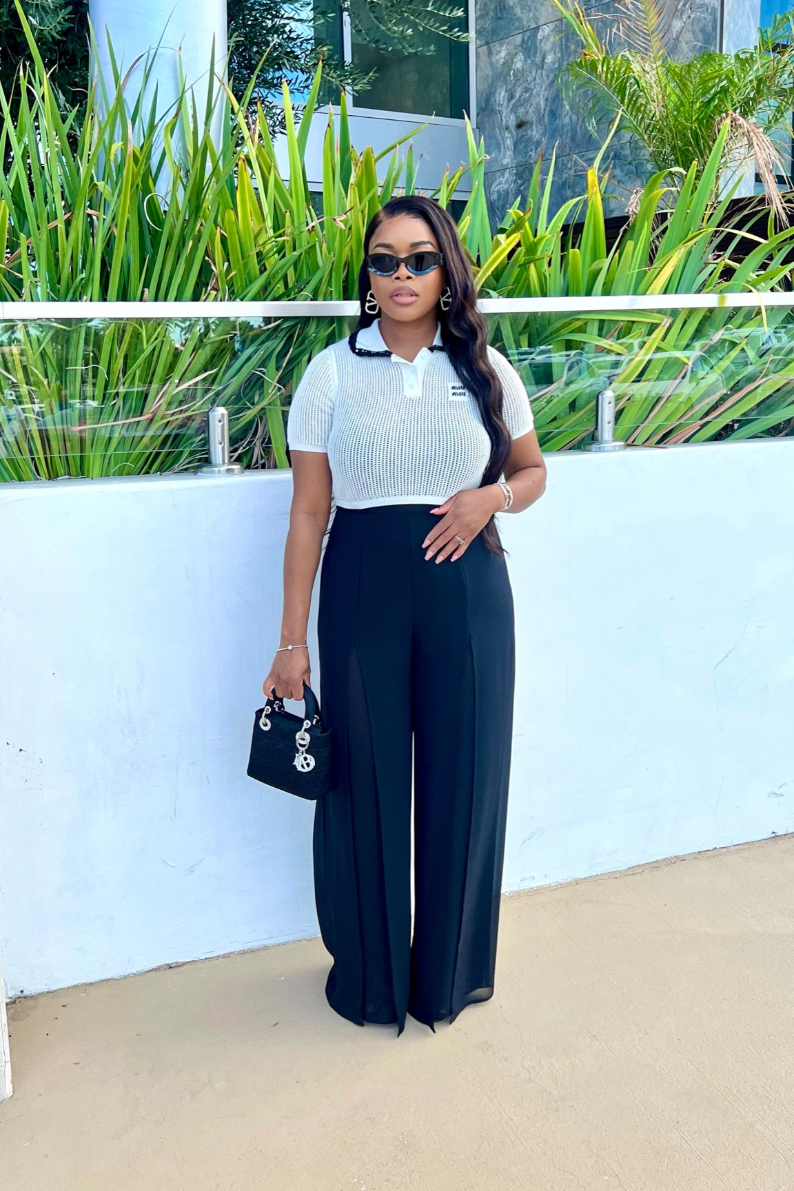 I heard you were looking for #styleinspo 💋 #yourewelcome 

Let’s Talk Details: 

Sunnies: @miumiu 
Earrings: @maisonvalentino 
Bag: @dior 
Top: @miumiu 
Bottoms: Thrifted from @goodwillintl  many years ago (will keep FOREVER! 😂) 
Shoes: @zara 

#itgirl #itgirlstyle #miumiu #miumiusunglasses #valentino #valentinoearrings #zara #ladyDior #Dior #outofmyscrubs #docbae #chicagocreator 

#LTKitbag #LTKstyletip