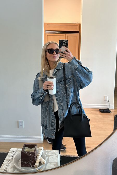 Typical errand look running out the door with multiple beverages in hand 😂 I wear this khaite denim jacket nonstop, it was $$$ but well worth the investment for me. Linked an amazing dupe I love too.

Sizes worn here:
Jacket XS (extremely oversized)
Top XS (TTS)
Leggings XS (TTS, two length options, I wear the 27”)
Bag is the Row

#LTKStyleTip